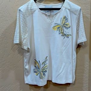 Beautiful white top with butterfly accents